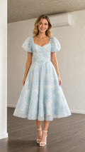 Front view of light blue puff sleeve midi dress