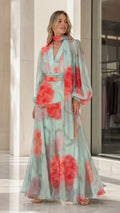 Front view of mint green watercolor floral chiffon maxi dress with bishop sleeves and neck scarf