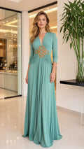 Sage green deep V-neck ruched maxi dress with gold waist motif front view