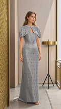 Silver Gray floor-length evening gown with beaded capelet overlay and front embellishments