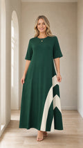 Front view of woman wearing Forest Green color-blocked maxi dress