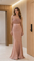 Blush pink mermaid formal gown with pearl fringe cap sleeves and floral applique bodice front view