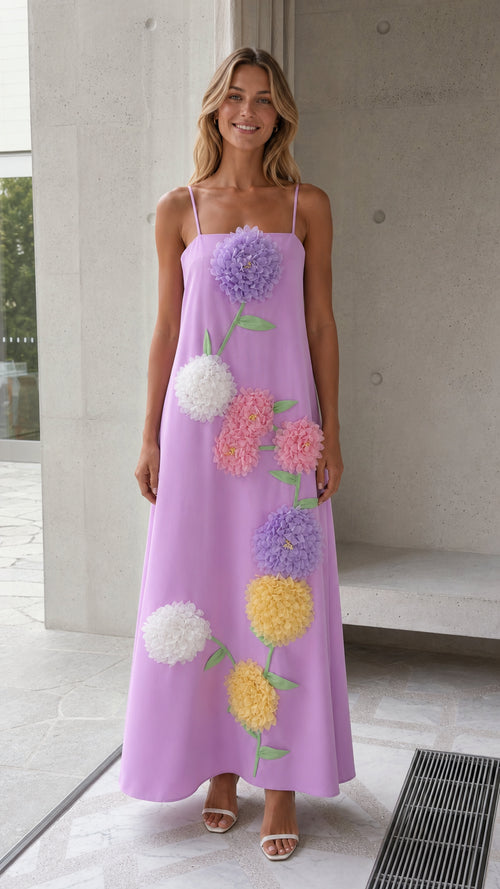 Front view of lavender spaghetti strap maxi dress with 3D floral appliqué