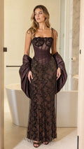 Front view of model wearing chocolate brown corset bodice beaded fringe evening gown with puff sleeves