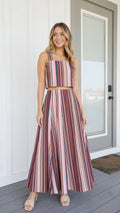 Front view of woman wearing pink striped two-piece set