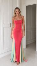 Front view of coral pink spaghetti strap mermaid maxi dress with pastel flared hem