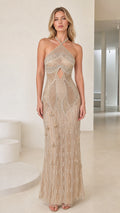 Front view of champagne beaded halter neck evening dress