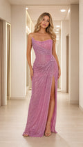Front view of model wearing dusty rose strapless shimmer evening gown with side slit