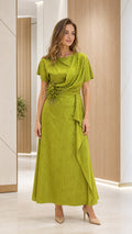 Front view of woman wearing chartreuse green floral jacquard cowl neck maxi dress