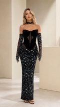 Front view of black strapless sequin evening gown with matching gloves