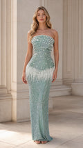 Front view of mint green strapless sequin evening gown with pearl fringe detail