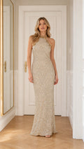 Champagne gold sequin halter maxi evening gown front view