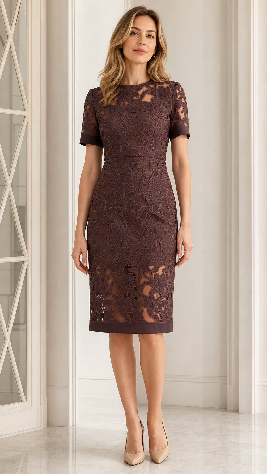Front view of woman wearing plum floral lace sheath dress with short sleeves and illusion hem