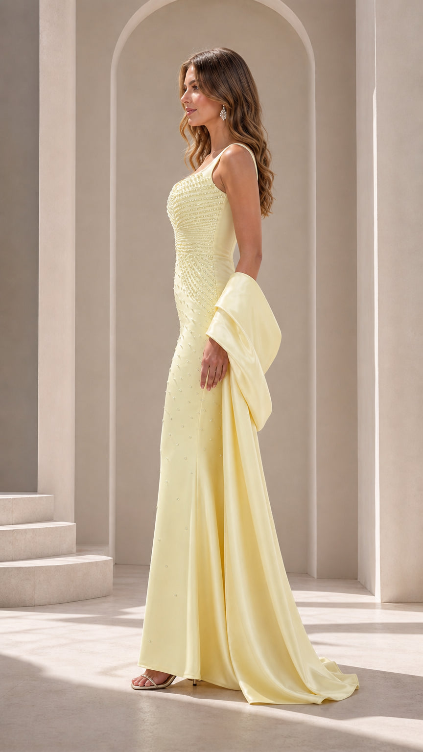 Side profile view of Butter Yellow fitted mermaid formal dress