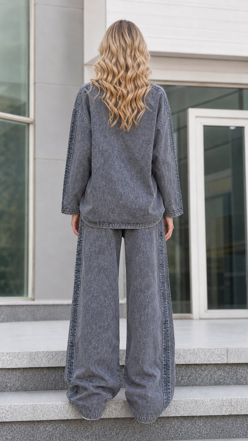 Back view of charcoal grey washed lounge set with relaxed wide leg trousers