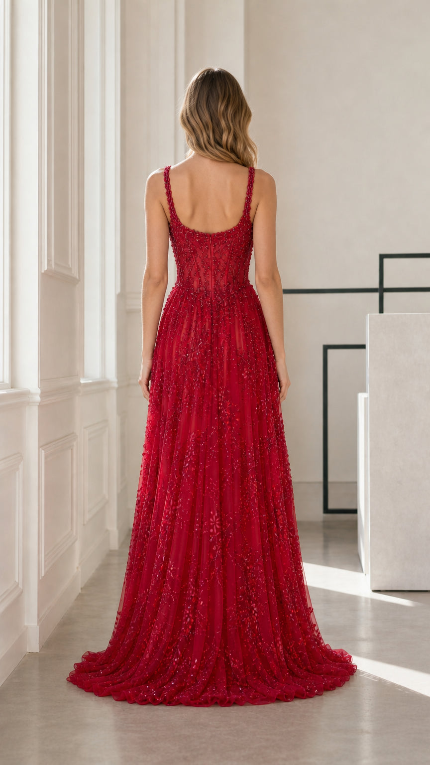 Back view of red beaded evening gown