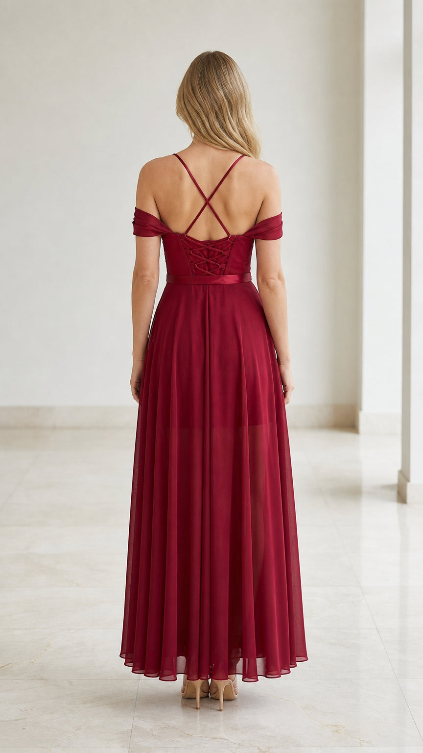 Back view showing lace-up details of burgundy dress