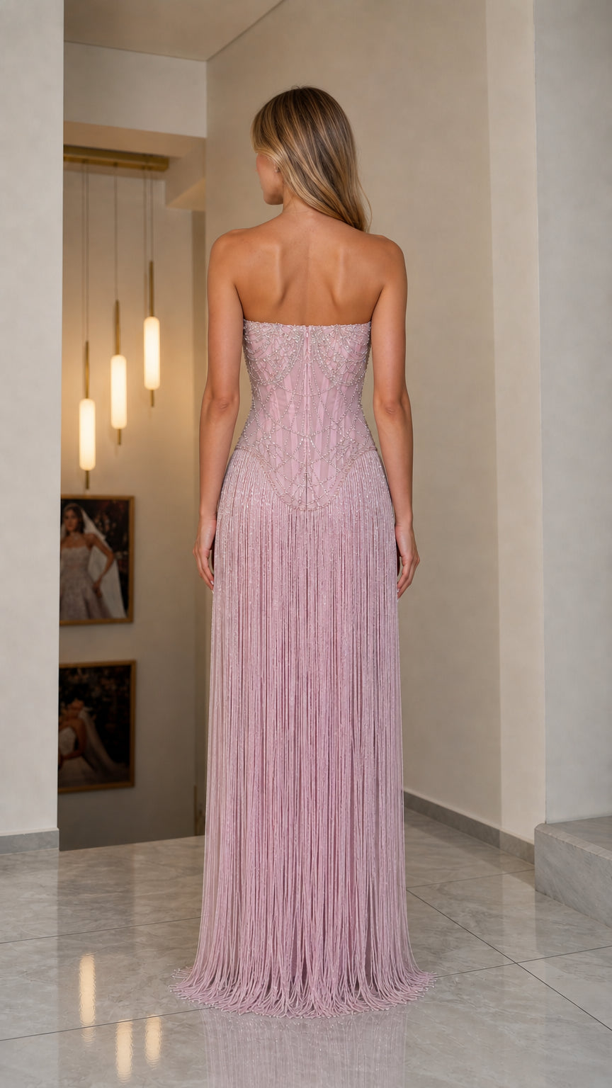 Back view of pink beaded fringe evening gown