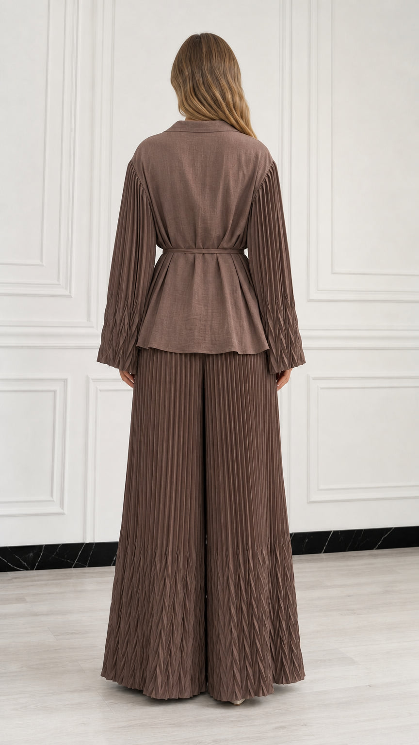 Back view of woman wearing Mocha Brown belted pleated top and wide leg trousers