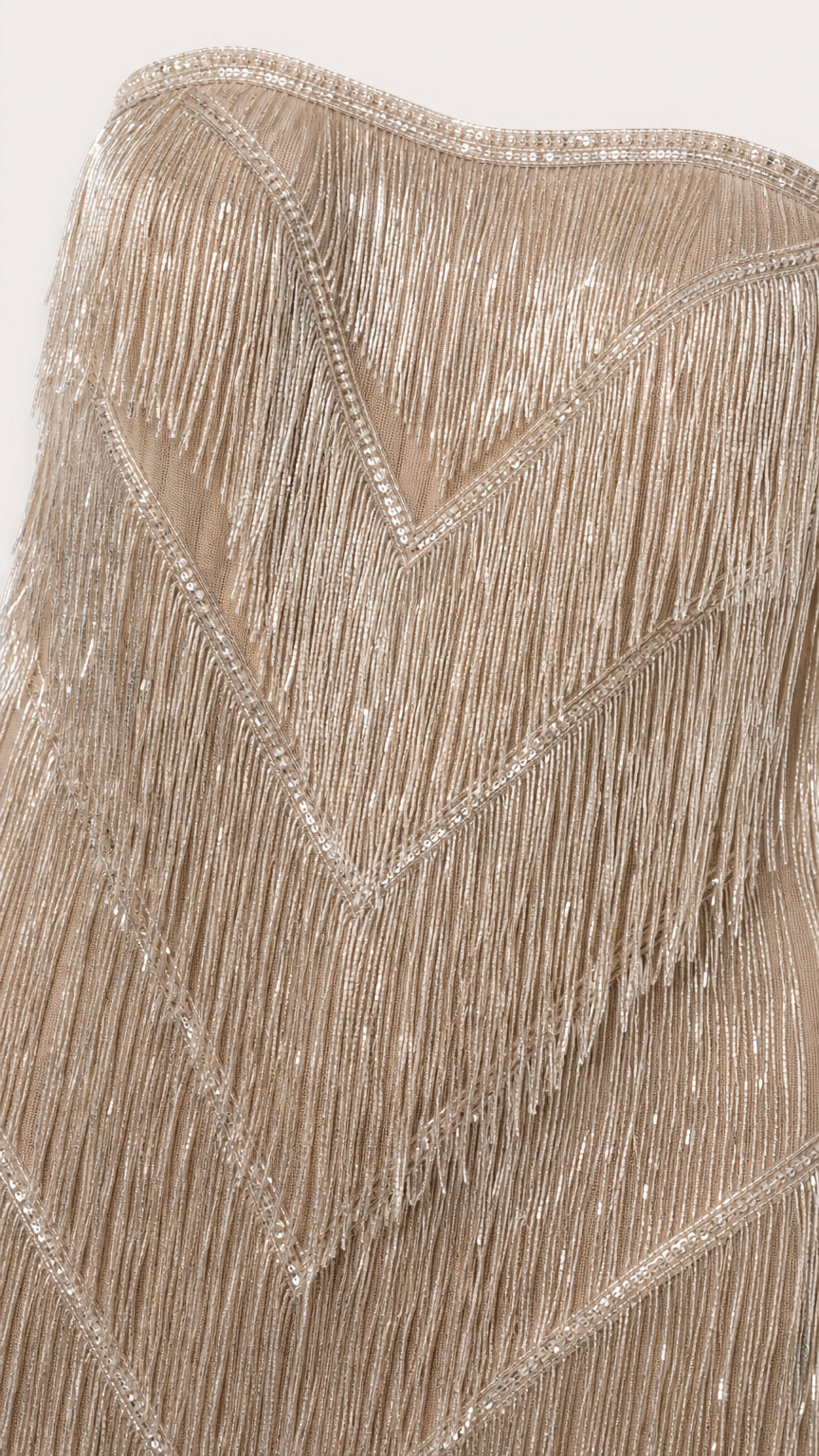 Close-up detail of tiered chevron beaded fringe texture