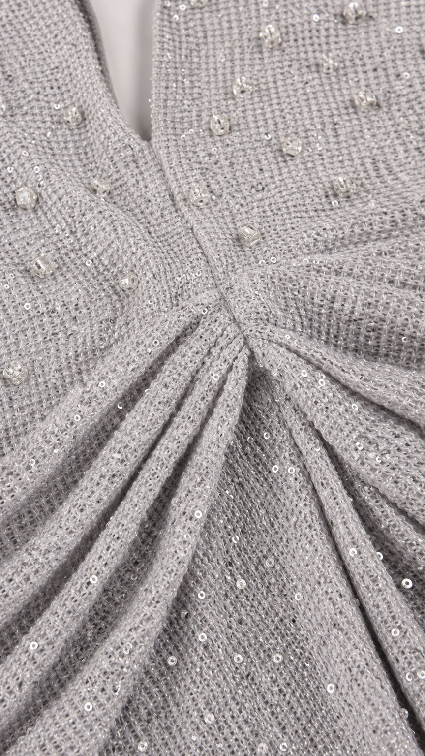 Close-up detail of beaded and sequined bodice texture